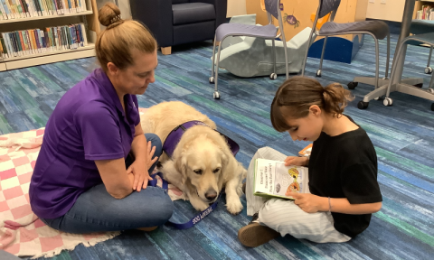 child reading to a dog