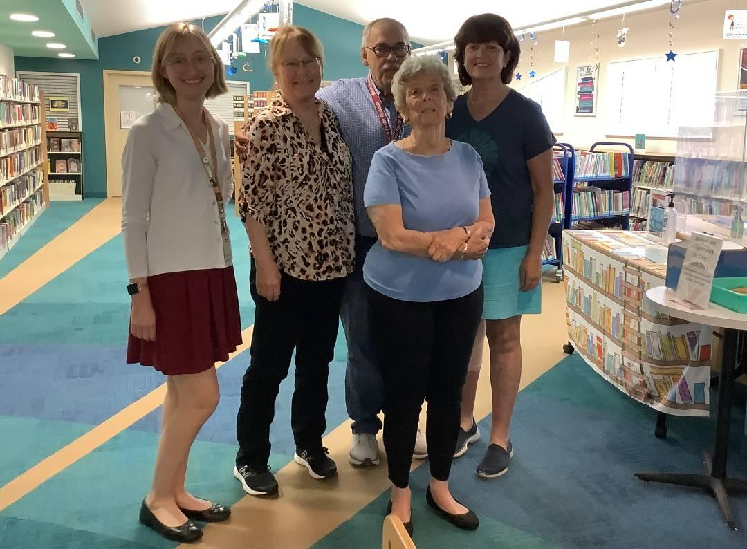 children's librarian and a group of volunteers